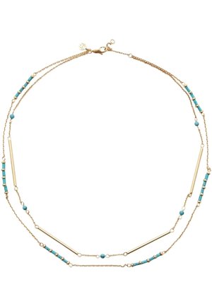 Collier délicat à double chaîne en or avec des perles turquoise et de fines barres en or espacées régulièrement le long des chaînes.