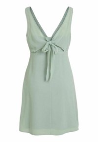 Robe sans manches vert clair avec un profond décolleté en V et un détail de nœud devant, avec une jupe légèrement évasée à hauteur du genou.