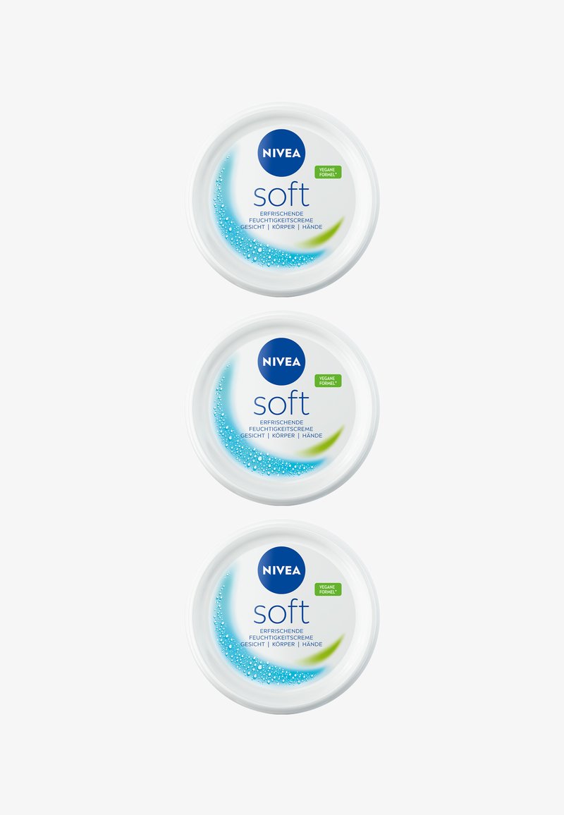 Three stacked NIVEA Soft moisturizing cream containers with blue, green, and white label details in German.