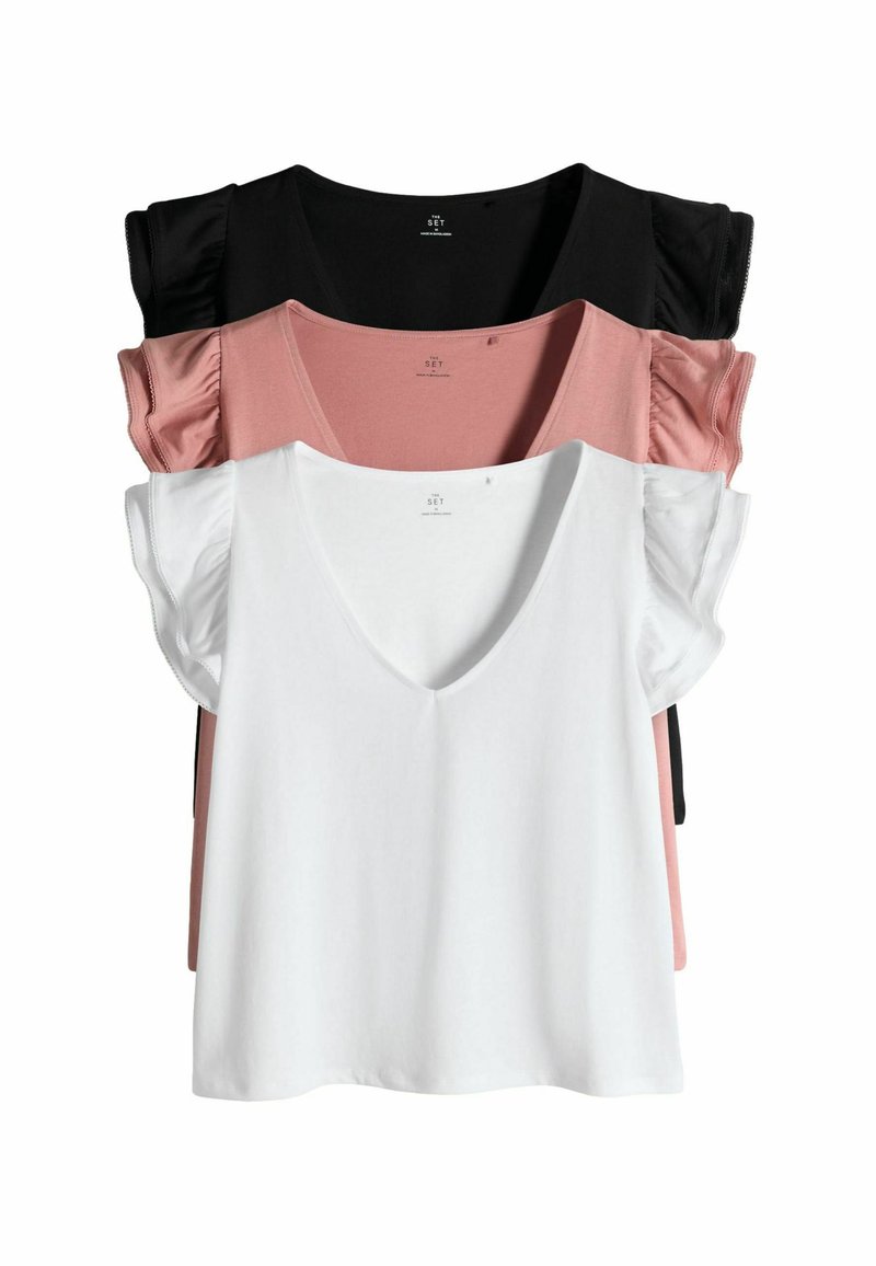 Sada troch dámskych tričiek v bielej, ružovej a čiernej farbe. Každé má krátke volánové rukávy a hlboký výstrih do V s jemnou textúrou.