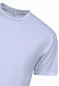 T-shirt met korte mouwen in lichtblauwe katoen, voorzien van een ronde hals en een gladde, effen textuur zonder zichtbare patronen of accenten.