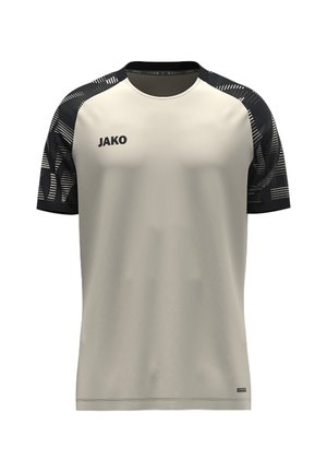 T-shirt de sport à manches courtes avec corps beige et manches noires à motifs, avec le logo de la marque JAKO sur la poitrine gauche.
