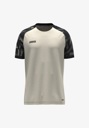 Maglia sportiva a maniche corte con corpo beige e maniche nere con motivo, con il logo del marchio JAKO sul petto sinistro.