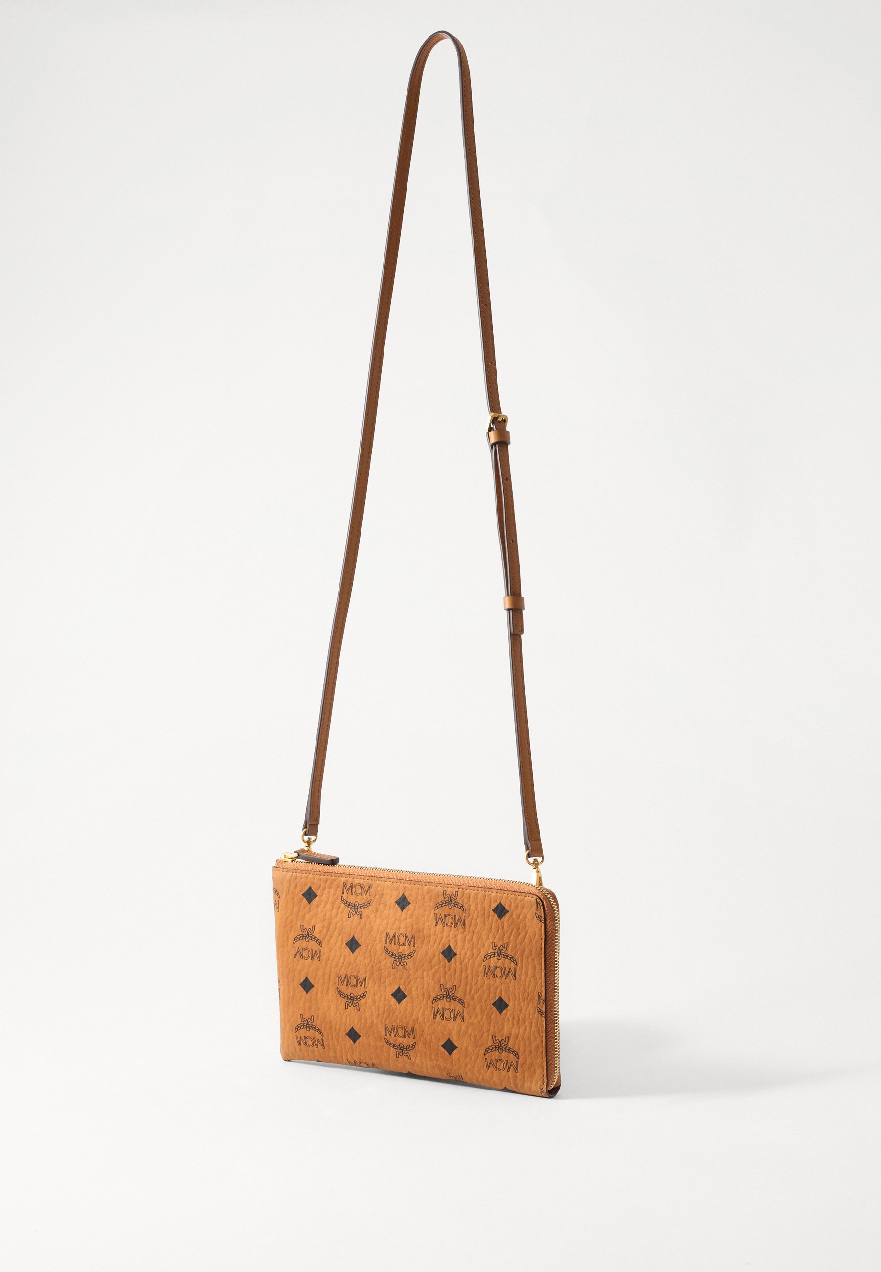 MCM OTTOMAR DOCUMENT CASE - Cross body bag - cognac - Zalando.co.uk