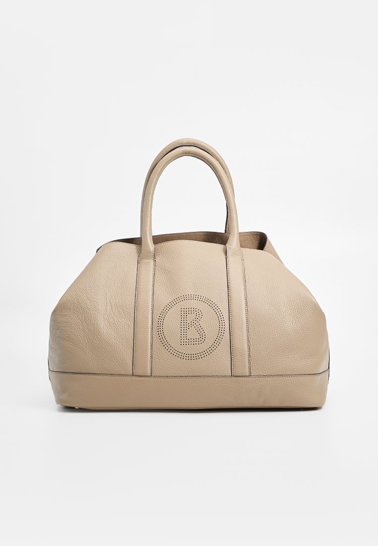 Beige leren handtas met een afgeronde vorm, twee handvatten en geperforeerde logo-details. Heeft gestikte accenten langs de naden.
