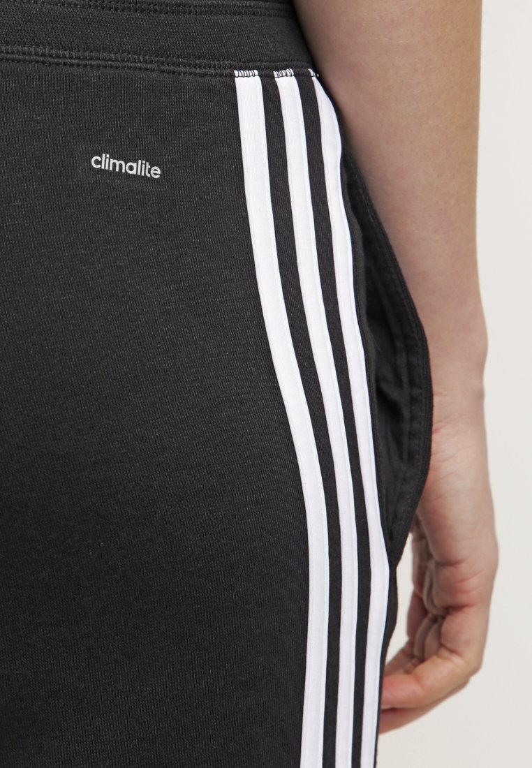 adidas Performance - Tracksuit bottoms - black/white/black -