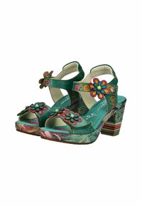 Sandalias de plataforma turquesas con adornos florales, diseño de punta abierta y tacón a rayas. Presenta correas de cuero y plantilla acolchada.