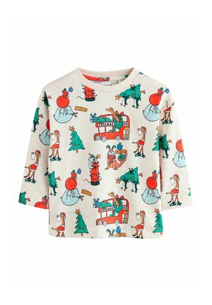 Camicia a maniche lunghe in cotone crema con una stampa festiva che presenta illustrazioni di elementi e personaggi natalizi in rosso, verde e blu.