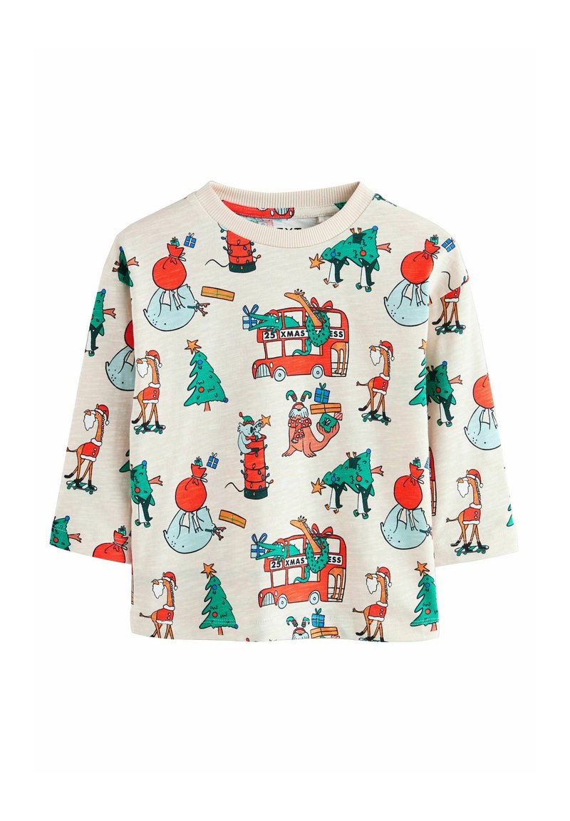 Chemise à manches longues en coton crème avec un imprimé festif comportant des illustrations rouges, vertes et bleues d'éléments et de personnages de Noël.