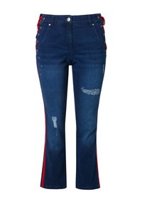 Tummansiniset farkut korkealla vyötäröllä, punaiset sivuraitat, nauhakiinnitys sivuilla, kuluneet laikkuja ja suoramallinen leikkaus.