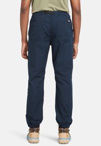 Timberland Teplákové kalhoty - dark sapphire