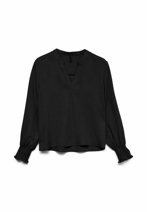 Zwarte blouse met lange mouwen van textuurstof, V-hals en gerimpelde ruffles bij de manchetten, plat gelegd op een witte achtergrond.