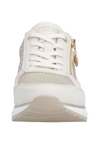 Light beige sneaker with mesh panels and a textured surface. Features laces, side zipper, and a subtle logo. Flat rubber sole with white accents.