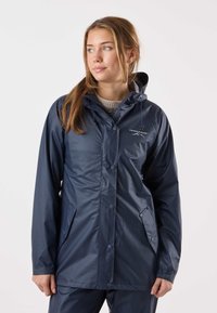 Waterproof navy rain jacket with a hood, front snap closures, two side pockets, and a subtle logo on the chest. Smooth, shiny texture.