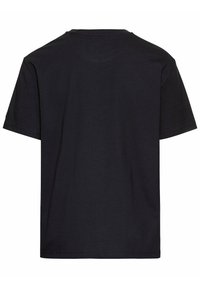 Zwarte katoenen T-shirt met een ronde hals, korte mouwen en een rechte zoom. Soepele textuur zonder zichtbare logo's of patronen op de achterkant.