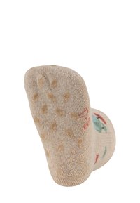Beige Sock mit strukturiertem Muster an der Sohle, mit floralem Design in grünen und roten Farbtönen. Weicher Stoff mit glatter Oberfläche.