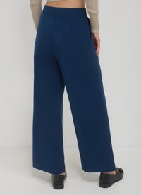 Calliope LUNGO BOTTONE - Pantaloni - blu