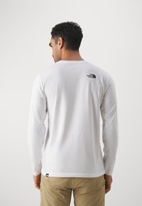 The North Face SIMPLE DOME TEE - Long sleeved top - white