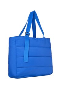 Blauwe gevoerde tote bag met sterke stoffen handvatten, voorzien van horizontale stikdetails en een gesp voor verstelbare bandlengte.