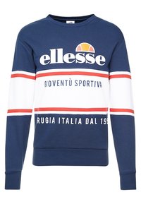 Blå och vit långärmad sweatshirt med röda ränder, "ellesse"-logga och italiensk text "Gioventù Sportiva" och "Perugia Italia Dal 1959".