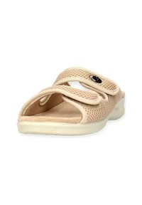 Sandalo scivoloso in rete beige con due cinturini regolabili e una soletta morbida. Presenta una punta arrotondata e una suola bianca imbottita.