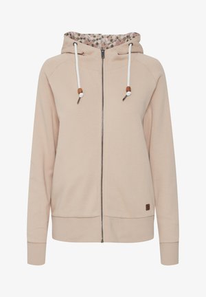 Helle pinke Zip-Hoodie mit einem floral gemusterten Innenfutter in der Kapuze, weißen Kordeln mit Holzakzenten sowie gerippten Bündchen und Saum.