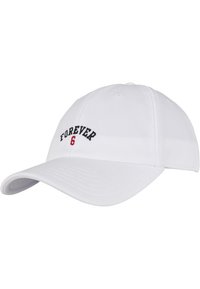 White baseball cap with a curved brim. Features embroidered text "FOREVER" in black and "6" in red on the front. Made of textured fabric.