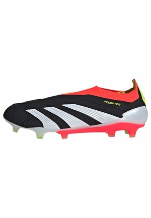 Black and white synthetic soccer cleat with a red upper, featuring distinct ridges and a pink sole. Includes multiple studs for traction.