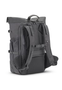 Gray backpack with a roll-top design, padded straps, mesh back, side pockets, and adjustable hardware for secure fitting. Textured fabric finish.