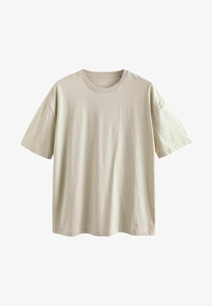 Béžové bavlněné tričko s krátkými rukávy, kulatým výstřihem a volným střihem. Hladká textura s jednoduchým designem, bez viditelných vzorů nebo akcentů.