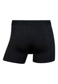 Sorte boxer-shorts lavet af glat stof, med et tekstureret taljebånd med prægning af branding, samt et tætsiddende design med afrundede benåbninger.