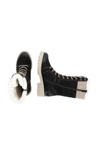 Black insulated boots with a faux fur lining, textured black upper, beige rubber sole, and silver metal eyelets. Features a side zipper.