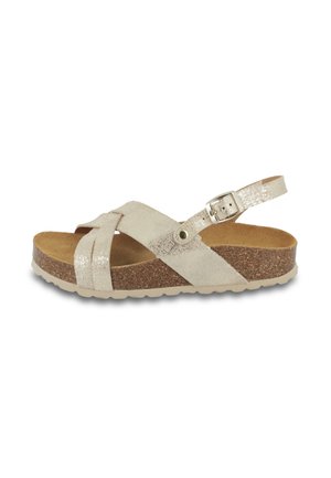 Light beige sandals with crisscross synthetic straps, adjustable ankle strap, cork footbed, and textured rubber sole.