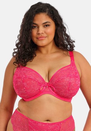 Roze kanten bh met gewatteerde cups, bloemmotief en een centrale strikdetail. Voorzien van verstelbare bandjes en een gladde, seizoentextuur.