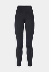 Svart høytlivs leggings laget av elastisk materiale, med en glatt tekstur og perforerte designdetaljer nær anklene.
