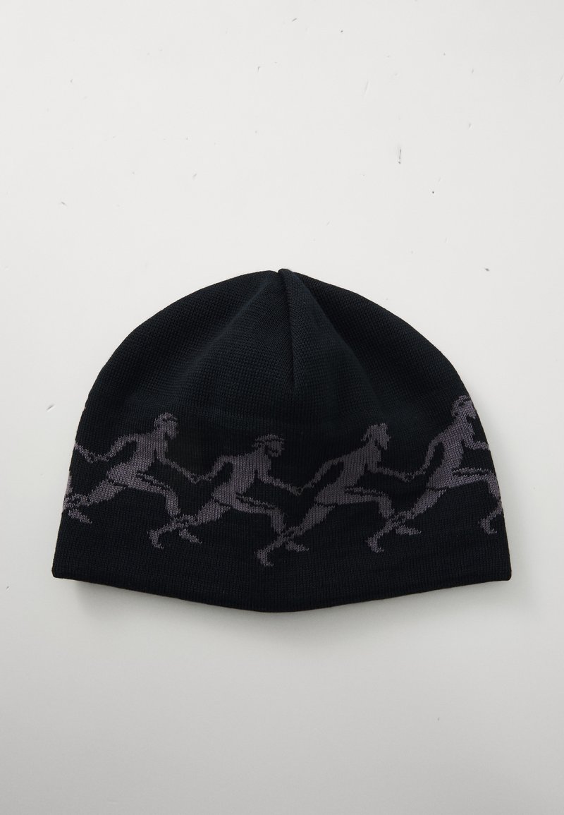 Black knitted beanie with a pattern of four dark gray running human figures holding hands encircling the hat.