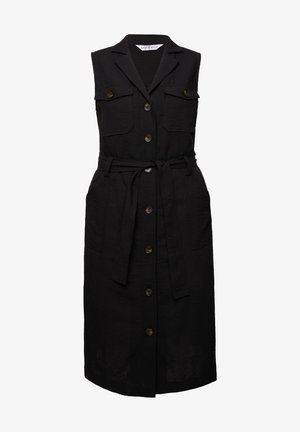 Abito nero senza maniche in un tessuto testurizzato, con bottoni frontali, due tasche sul petto, una vita da annodare e un taglio all'altezza del ginocchio.