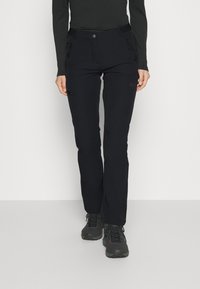 Mustad väljas pant, mis on valmistatud softshell materjalist, omades kitsast lõiget, tõmblukuga taskuid ja sujuvat tekstuuri koos peene logode detailiga.