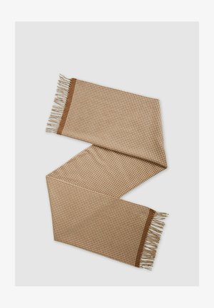 Brūns un krēmkrāsas šahs sarkans ar šķipsnu malām, izgatavots no mīkstas auduma; taisnstūra forma, teksturēts raksts visā virsmā.