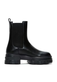 Bottine Chelsea en cuir noir avec panneaux élastiques sur les côtés et languette de traction, dotée d'une semelle en caoutchouc épaisse avec des accents texturés et une forme large.