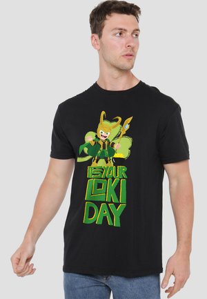 Black cotton t-shirt featuring a colorful graphic of a cartoon character with horns, accompanied by the text "It’s Your Loki Day."