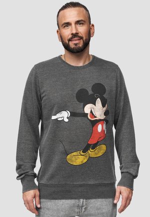 Grauer Sweatshirt mit einer großen Grafik von Mickey Mouse, die rote Shorts, gelbe Schuhe und weiße Handschuhe trägt. Gerippte Bündchen und Saum.