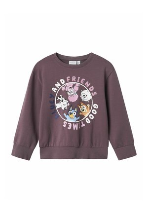 Lila Sweatshirt mit langen Ärmeln, featuring einen kreisförmigen Druck von Cartoon-Tieren und dem Text "Bluey und Friends Good Times". Weicher Stoff, gerippte Bündchen.