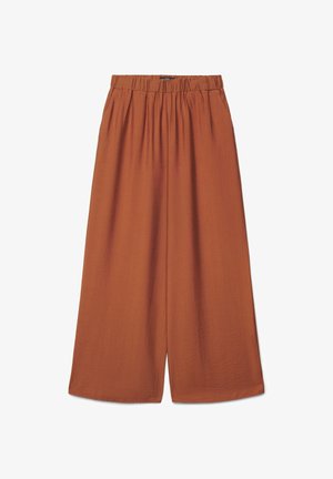 Pantalon à jambes larges et taille haute en tissu orange rouille avec une taille élastique et une coupe décontractée et fluide.