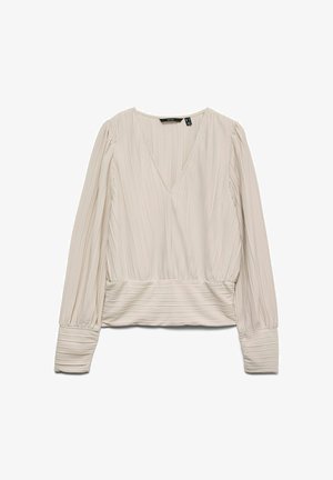 Hea beež pika varrukaga pluus vertikaalsete voldikute, V-kaeluse ja kogutud mansettidega; pehme, tekstuuriga kangas, millel on figureeriv vöökoht.