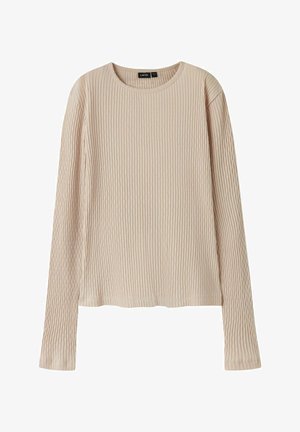 Beżowa bluzka z długim rękawem o prążkowanej fakturze, okrągłym dekolcie i prostym wykończeniu. Wykonana z miękkiego, lekkiego materiału dla maksymalnego komfortu.