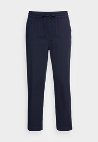 Pantalons bleu marine légers, à taille élastique avec cordon de serrage. Conception à jambe droite avec des coutures simples et sans motifs ni accents visibles.