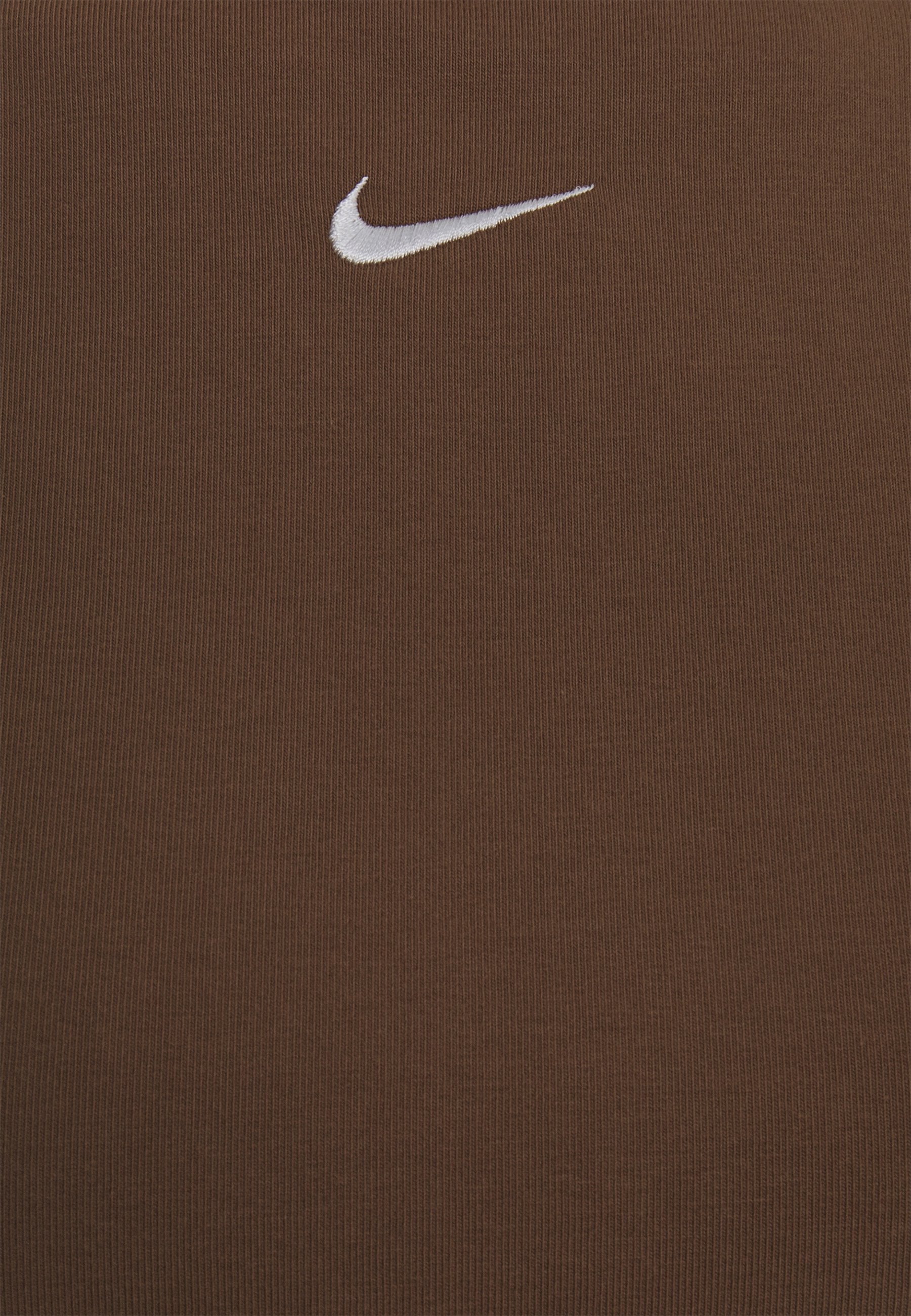 tan colored nikes