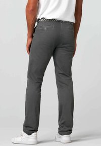 Gray cotton pants with a slim fit, featuring a woven belt, two rear pockets, and elastic cuffs at the ankles, paired with white sneakers.