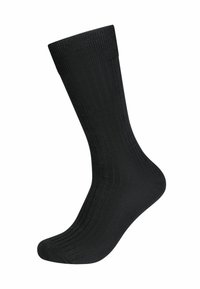 Calza nera a coste di lunghezza standard, realizzata in un tessuto liscio. Presenta una punta rinforzata e un bordo elastico per una vestibilità sicura.